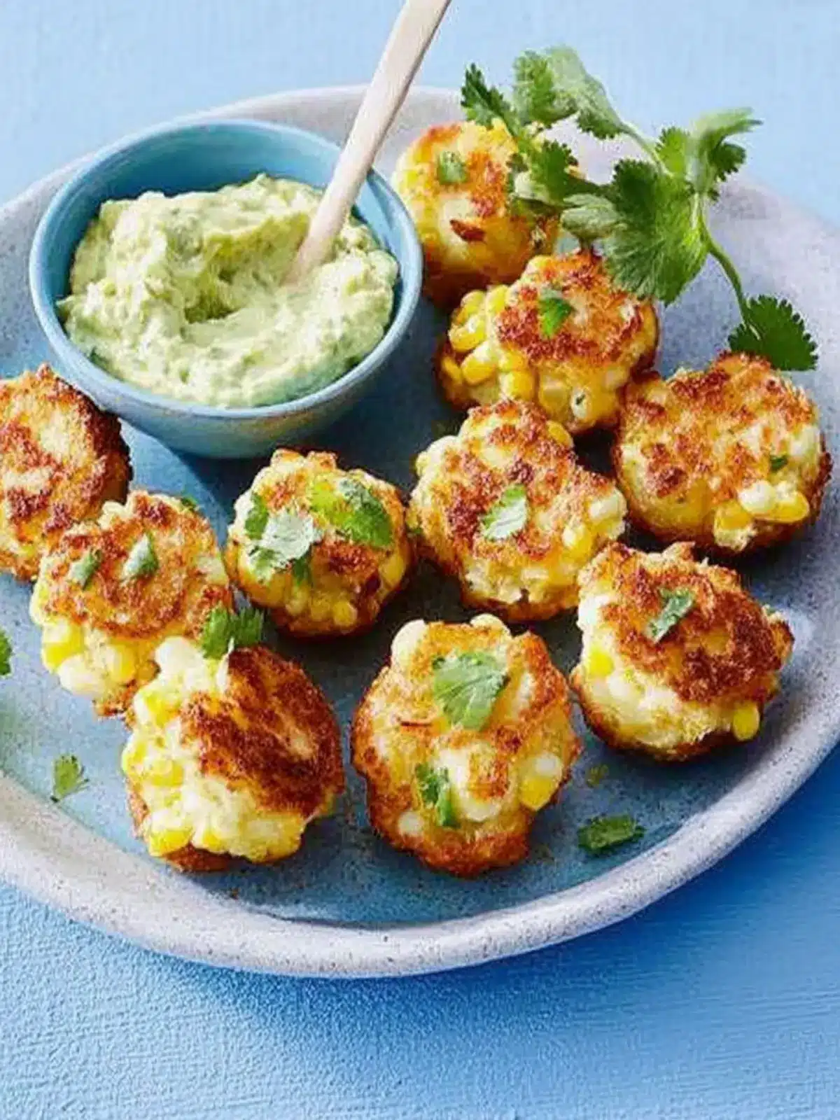 Haloumi and Corn Fritter Bites with Creamy Avocado Dip Delight 2 Haloumi and corn fritter bites with creamy avocado dip